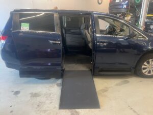 Blue Honda Odyssey with Vantage Mobility Side Entry Automatic In Floor conversion