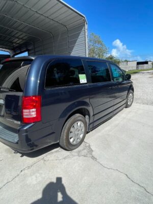 Blue Chrysler Town and Country with BraunAbility Side Entry Automatic Fold Out conversion