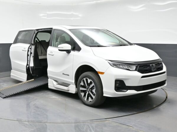 White Honda Odyssey with BraunAbility Side Entry Automatic In Floor conversion