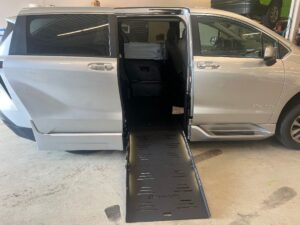 Silver Toyota Sienna with BraunAbility Side Entry Automatic Fold Out conversion