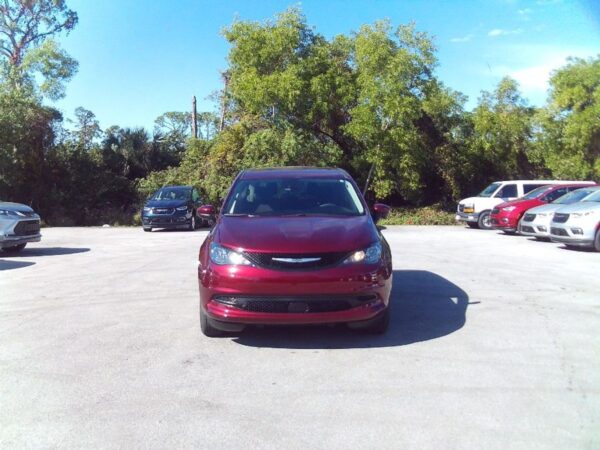 Red Chrysler Voyager with Vantage Mobility Side Entry Automatic In Floor conversion