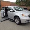 Silver Honda Odyssey with Vantage Mobility Side Entry Automatic In Floor conversion