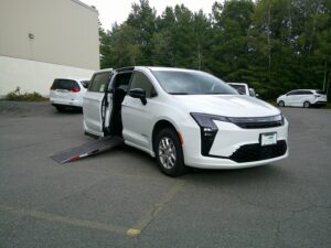 White Chrysler Pacifica with Driverge Side Entry Automatic Fold Out conversion