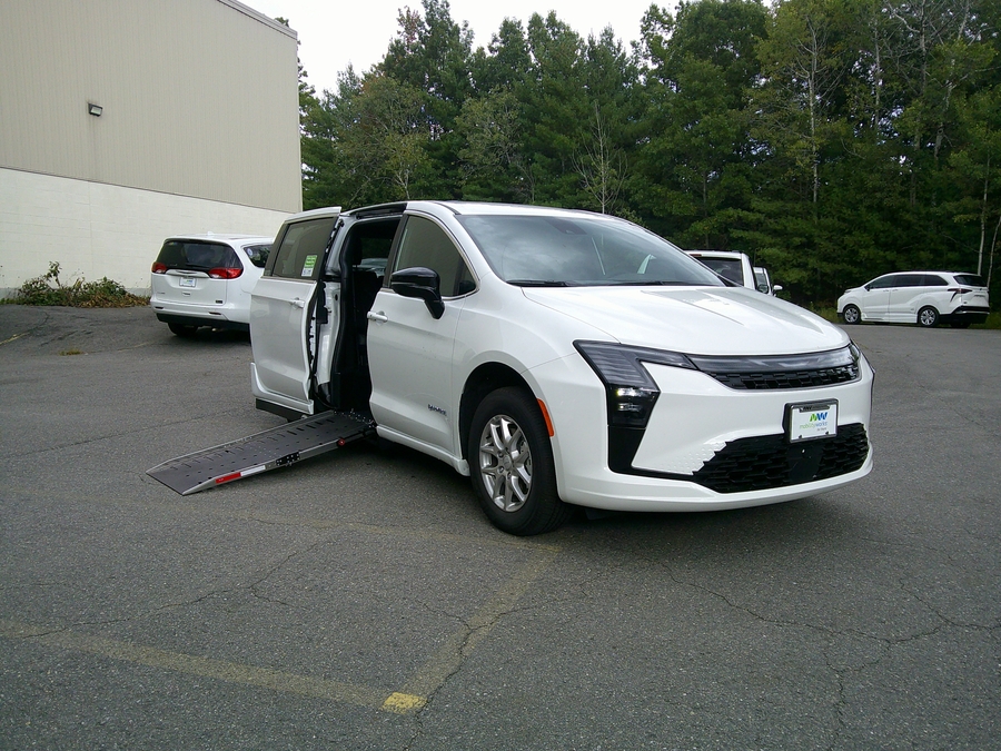 White Chrysler Pacifica with Driverge Side Entry Automatic Fold Out conversion