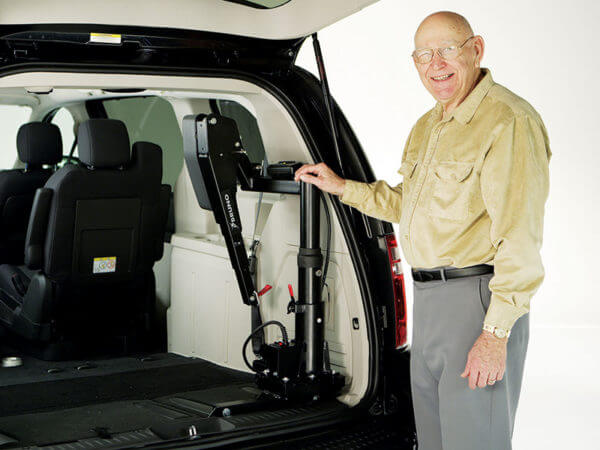 Older gentleman with Big Lifter folded up in the back of minivan