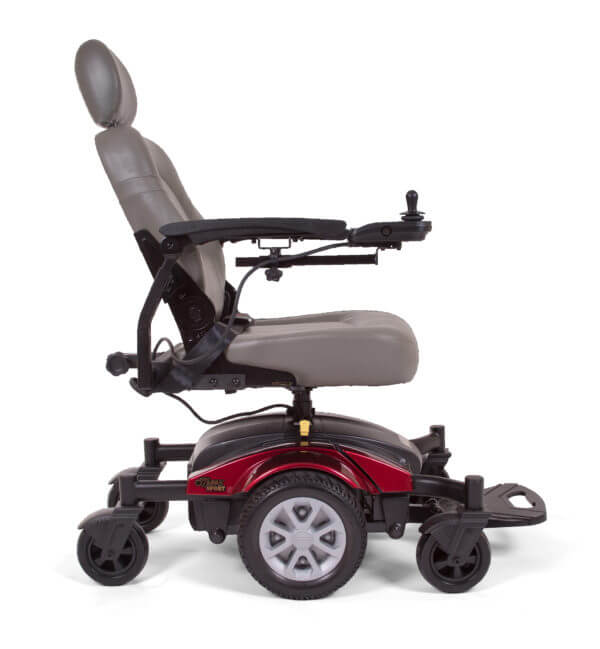 side view of red Golden Technologies Compass Sport power wheelchair