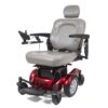 front view of red Compass Sport power wheelchair with foot rest