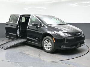 Black Chrysler Voyager with BraunAbility Side Entry Manual Fold Out conversion