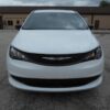 White Chrysler Voyager with FR Conversions Rear Entry Manual Fold Out conversion