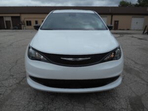 White Chrysler Voyager with FR Conversions Rear Entry Manual Fold Out conversion