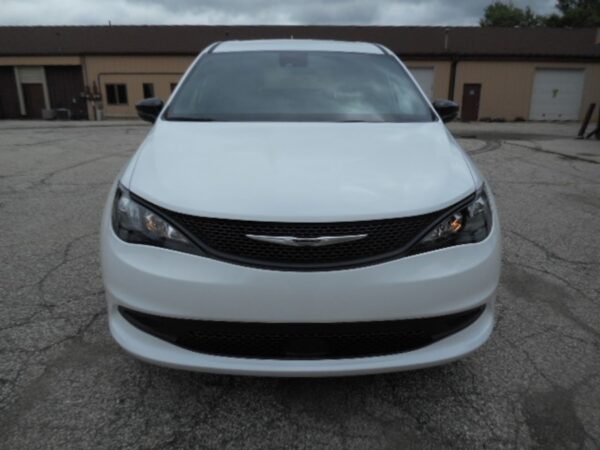 White Chrysler Voyager with FR Conversions Rear Entry Manual Fold Out conversion