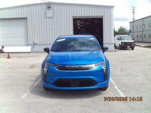 Blue Chrysler Pacifica with Driverge Side Entry Automatic Fold Out conversion