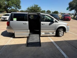 Silver Dodge Grand Caravan with BraunAbility Side Entry Automatic Fold Out conversion