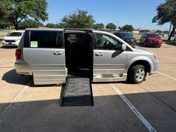 Silver Dodge Grand Caravan with BraunAbility Side Entry Automatic Fold Out conversion