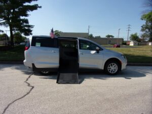 Silver Chrysler Voyager with BraunAbility Side Entry Automatic Fold Out conversion