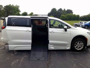 White Chrysler Voyager with BraunAbility Side Entry Automatic Fold Out conversion