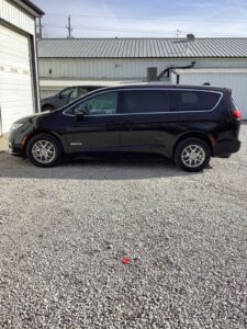 Black Chrysler Pacifica with Driverge Rear Entry Manual Fold Out conversion