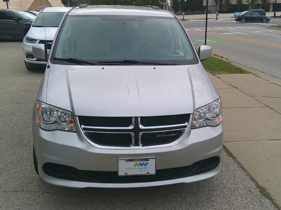 Silver Dodge Grand Caravan with Vantage Mobility Side Entry Automatic In Floor conversion