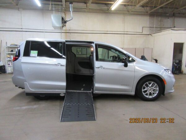 Silver Chrysler Pacifica with Driverge Side Entry Automatic Fold Out conversion