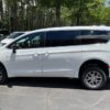 White Chrysler Voyager with FR Conversions Rear Entry Manual Fold Out conversion