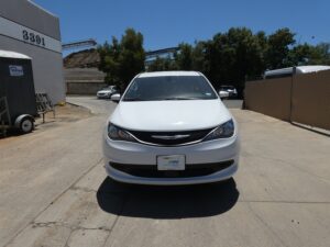 White Chrysler Voyager with Vantage Mobility Side Entry Manual In Floor conversion