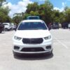 White Chrysler Pacifica with BraunAbility Side Entry Automatic In Floor conversion