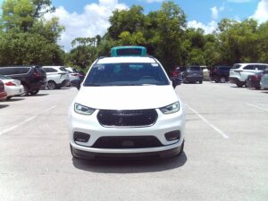 White Chrysler Pacifica with BraunAbility Side Entry Automatic In Floor conversion