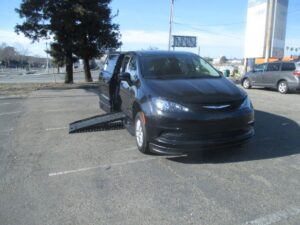 Black Chrysler Voyager with BraunAbility Side Entry Automatic Fold Out conversion