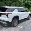 White Chevrolet Traverse with BraunAbility Side Entry Automatic In Floor conversion