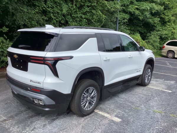 White Chevrolet Traverse with BraunAbility Side Entry Automatic In Floor conversion