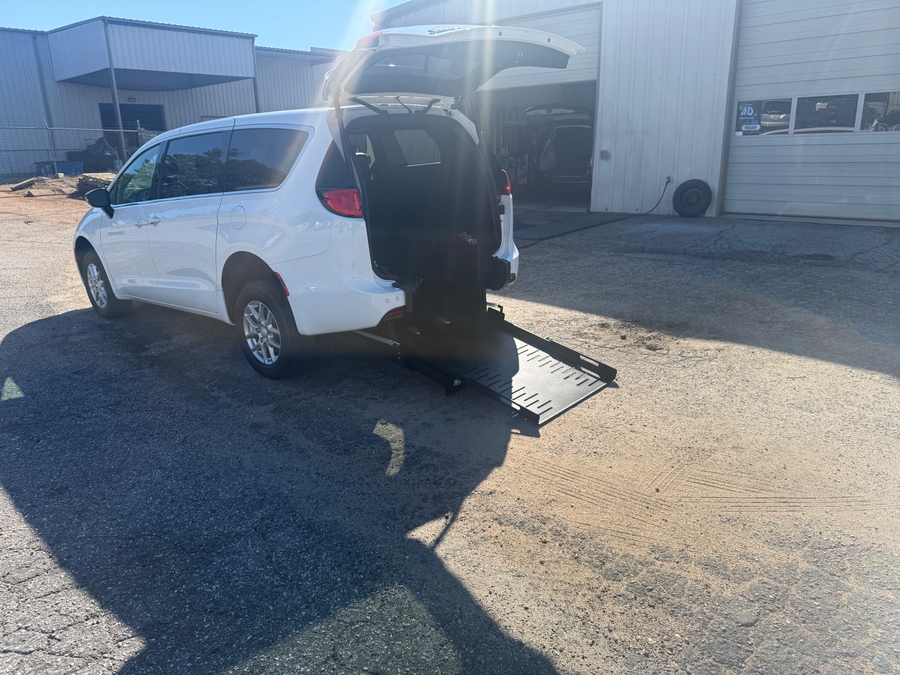 White Chrysler Pacifica with FR Conversions Rear Entry Manual Fold Out conversion