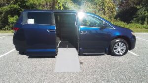 Blue Honda Odyssey with Vantage Mobility Side Entry Automatic In Floor conversion