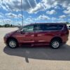 Red Chrysler Voyager with BraunAbility Side Entry Automatic In Floor conversion
