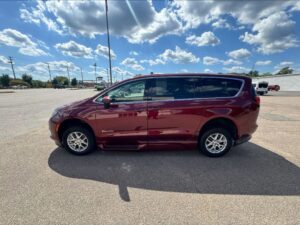 Red Chrysler Voyager with BraunAbility Side Entry Automatic In Floor conversion