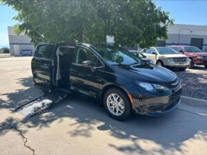 Black Chrysler Voyager with Driverge Side Entry Automatic Fold Out conversion
