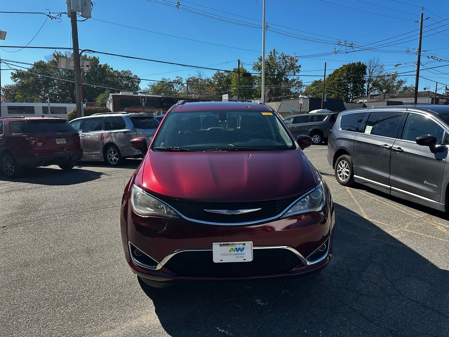 Red Chrysler Pacifica with BraunAbility Side Entry Automatic Fold Out conversion