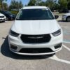 White Chrysler Pacifica with Driverge Rear Entry Manual Fold Out conversion