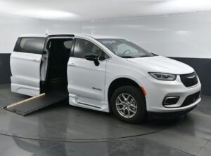 White Chrysler Pacifica with BraunAbility Side Entry Automatic In Floor conversion