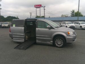 Silver Chrysler Town and Country with BraunAbility Side Entry Automatic Fold Out conversion