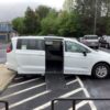 White Chrysler Voyager with Driverge Side Entry Automatic Fold Out conversion