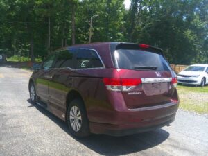 Red Honda Odyssey with Vantage Mobility Side Entry Automatic In Floor conversion