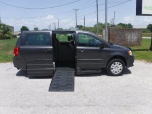 Grey Dodge Grand Caravan with BraunAbility Side Entry Automatic Fold Out conversion