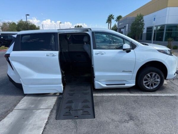 White Toyota Sienna with BraunAbility Side Entry Automatic Fold Out conversion