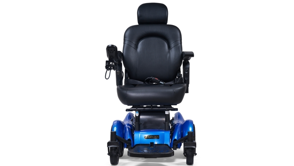 A front view of the Compass HD Power Wheelchair in blue and black, featuring a joystick on the armrest, set against a white background.