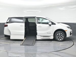 White Honda Odyssey with BraunAbility Side Entry Automatic In Floor conversion