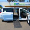 White Chrysler Pacifica with Driverge Side Entry Automatic Fold Out conversion