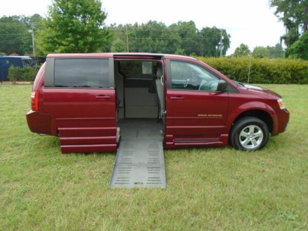 Red Dodge Grand Caravan with BraunAbility Side Entry Automatic Fold Out conversion