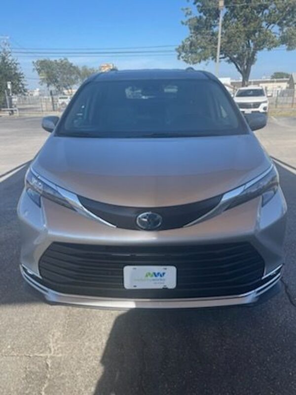 Silver Toyota Sienna with Driverge Rear Entry Manual Fold Out conversion