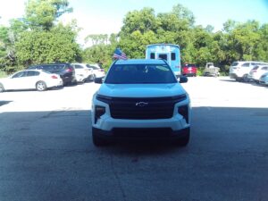 White Chevrolet Traverse with BraunAbility Side Entry Automatic In Floor conversion