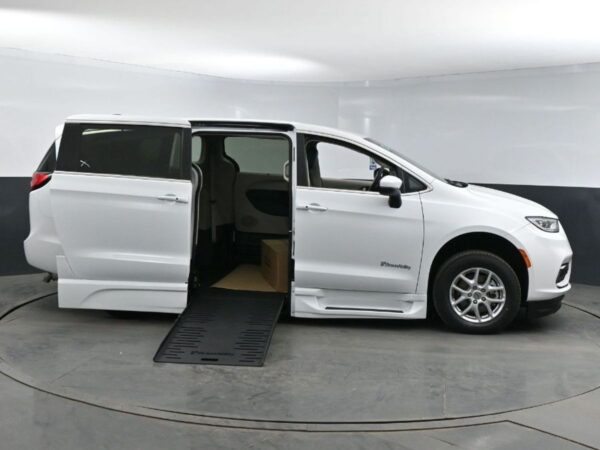 White Chrysler Pacifica with BraunAbility Side Entry Automatic Fold Out conversion